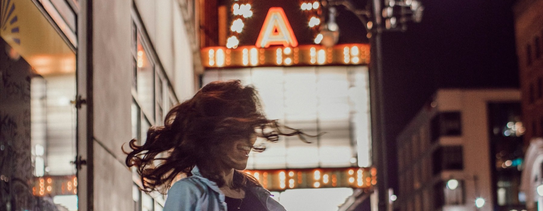 a person walking down a sidewalk
