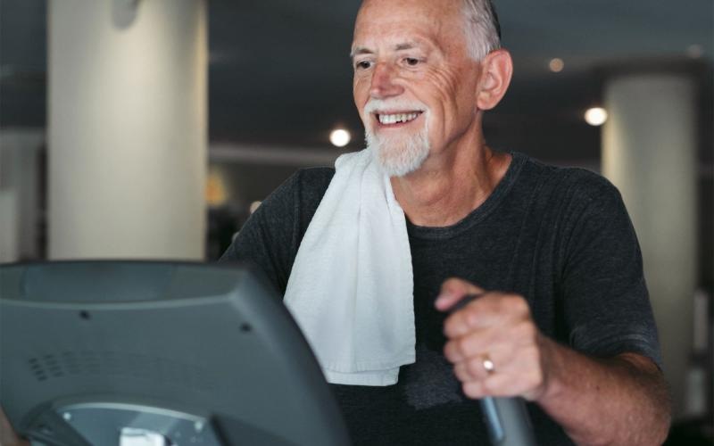 a man working out on an elliptical